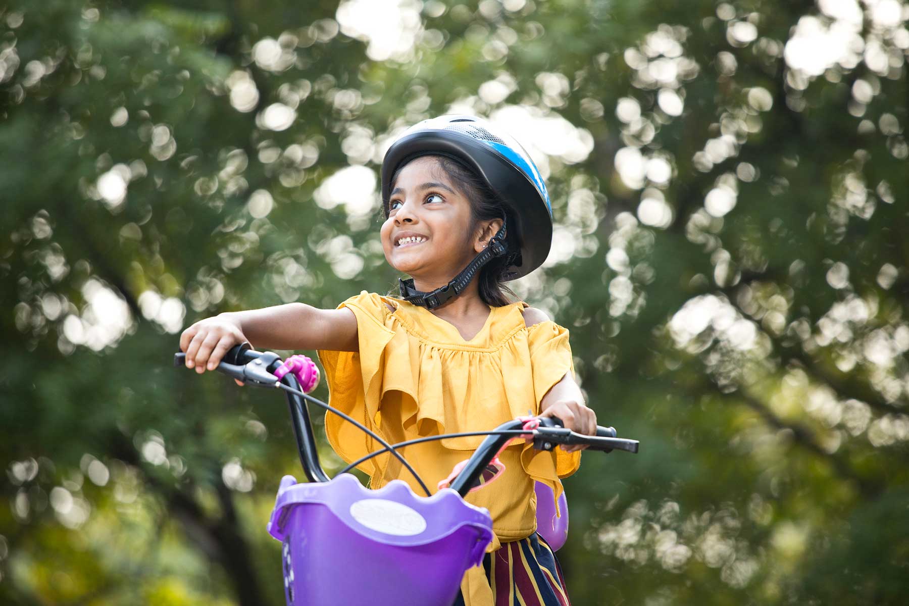 Little girl riding bike