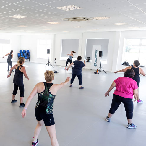 Women doing a Jazzercise class at the studio at Waterbeach