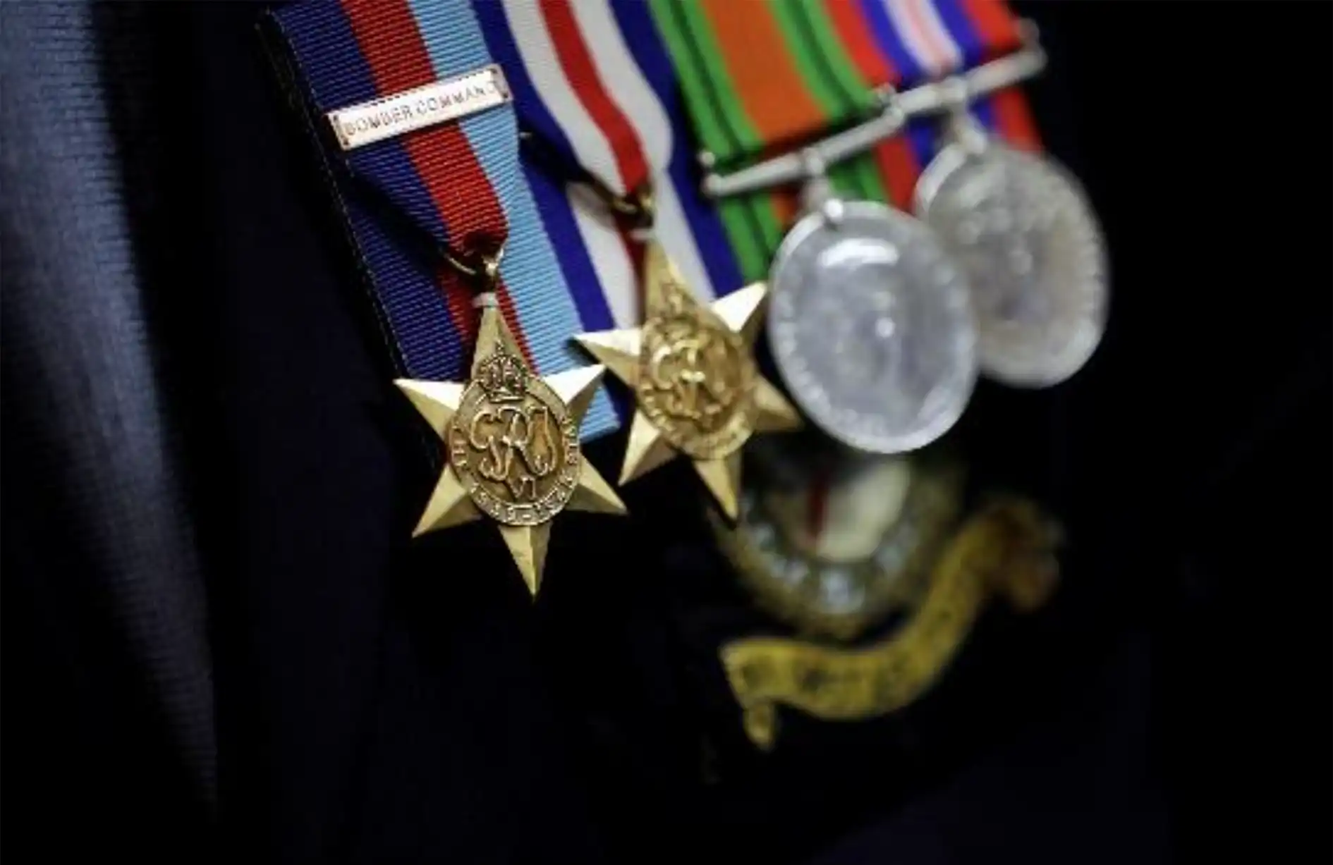 War medals pinned on a man's jacket breast