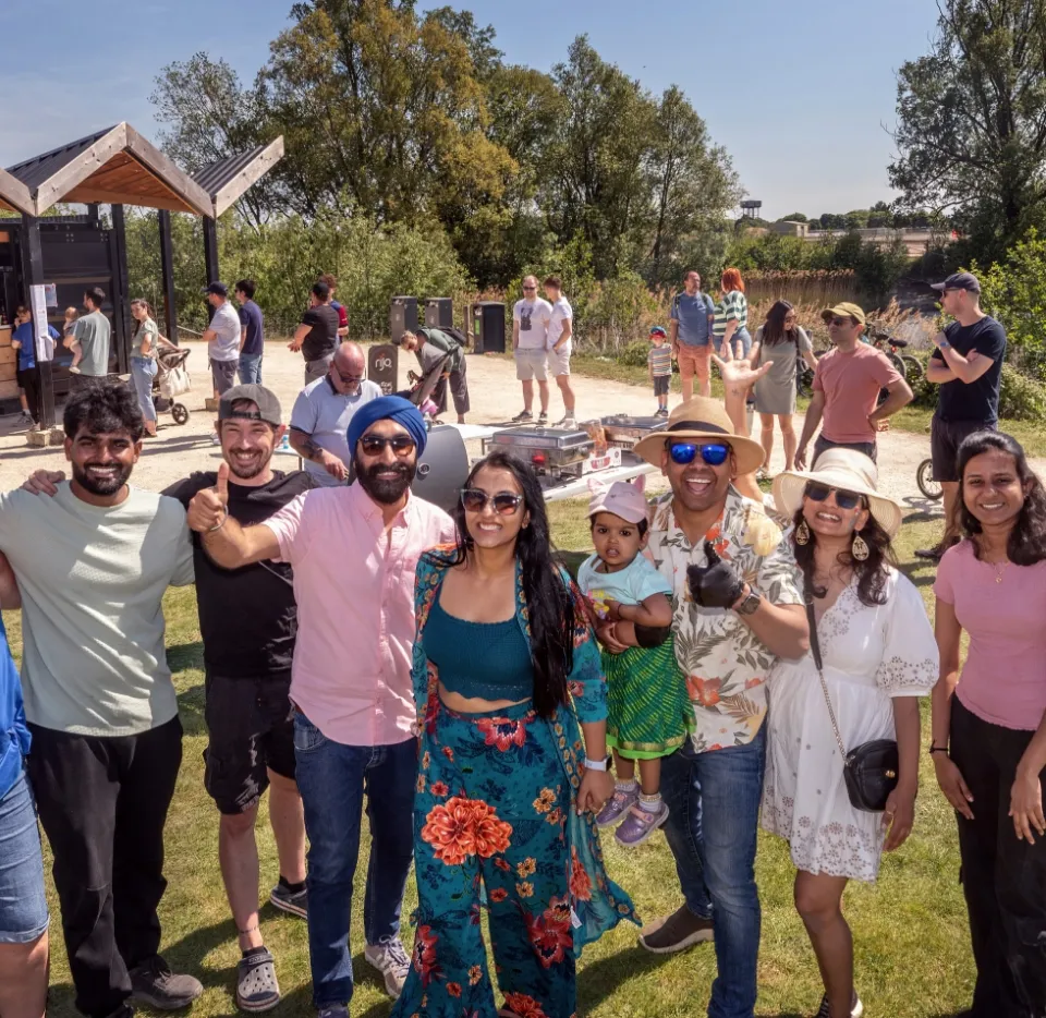 People together outside cafe at the lake