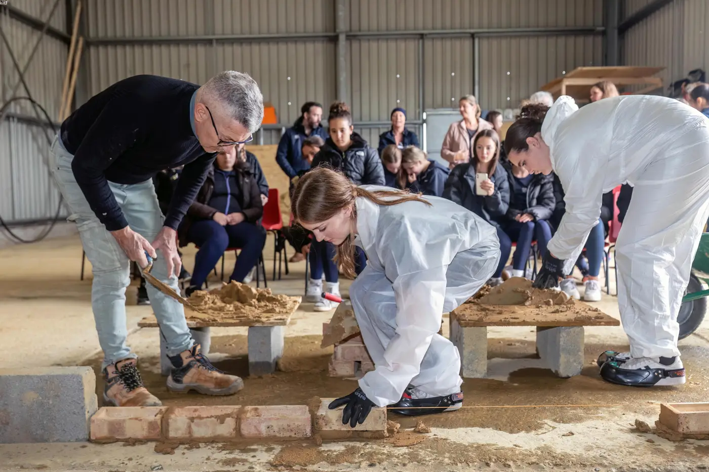 Girl placing bricks
