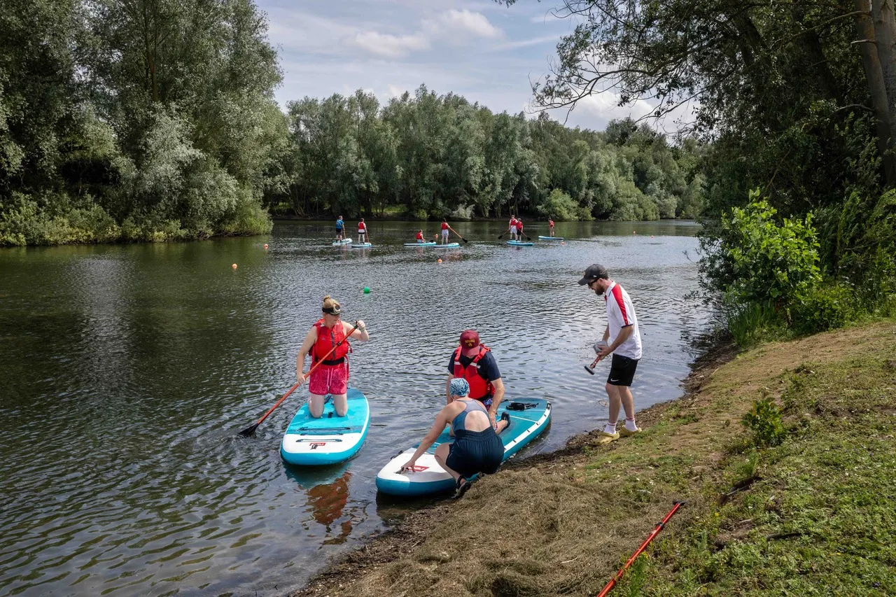 3 people paddleboarding